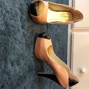 Nude and black pumps